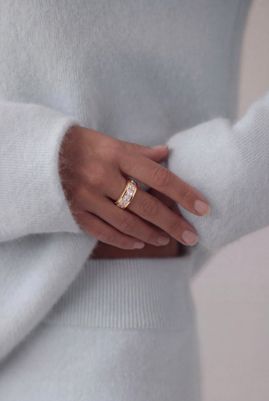The Baguette Eternity Ring with Pavé Halo